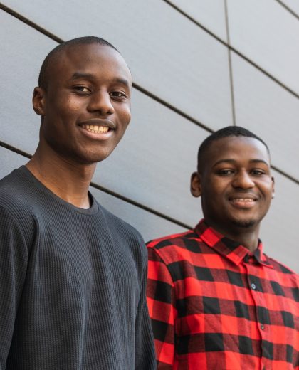 Teenager friends laughing looking at camera